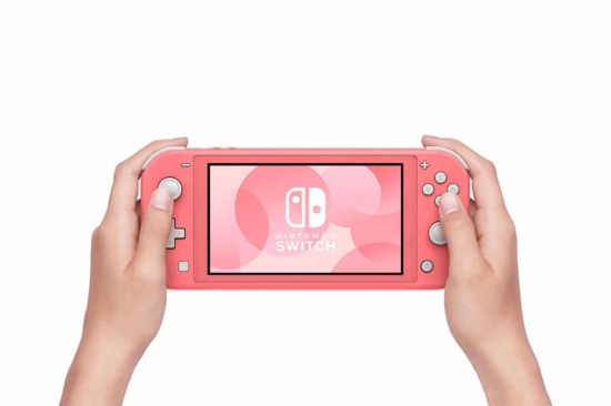 Nintendo Switch Lite Coral In-hand